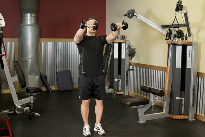 Alternating Deltoid Raise: end position
