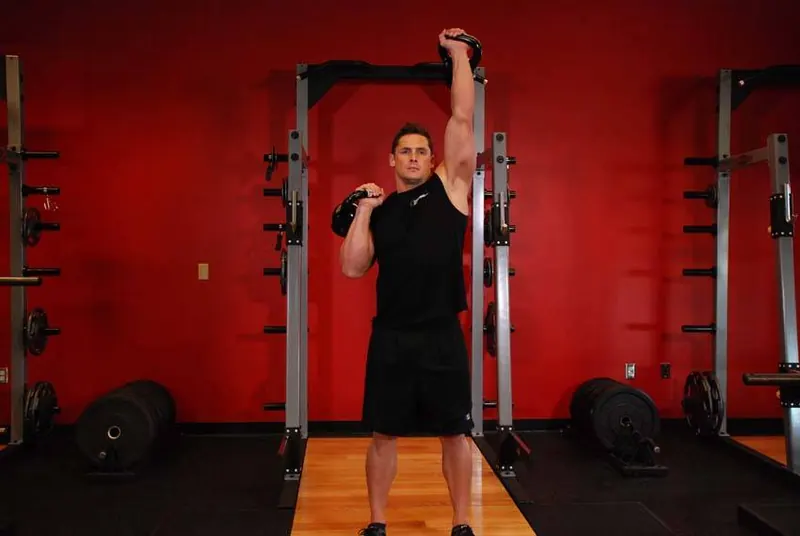 Alternating Kettlebell Press: end position