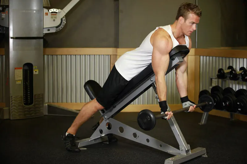 Barbell Curls Lying Against An Incline: starting position