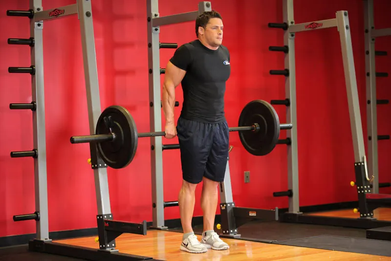 Barbell Shrug Behind The Back: end position