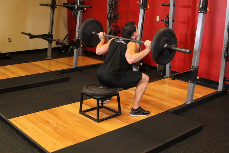 Barbell Squat To A Bench: end position