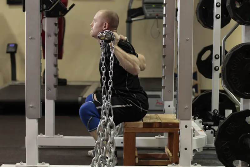 Box Squat with Chains: end position