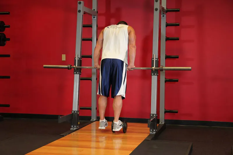 Calf Raise On A Dumbbell: starting position