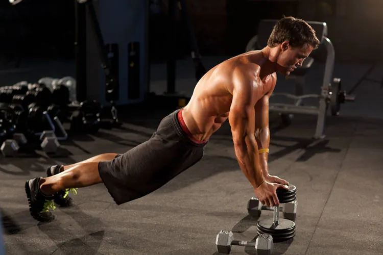 Close-Grip Push-Up off of a Dumbbell: starting position