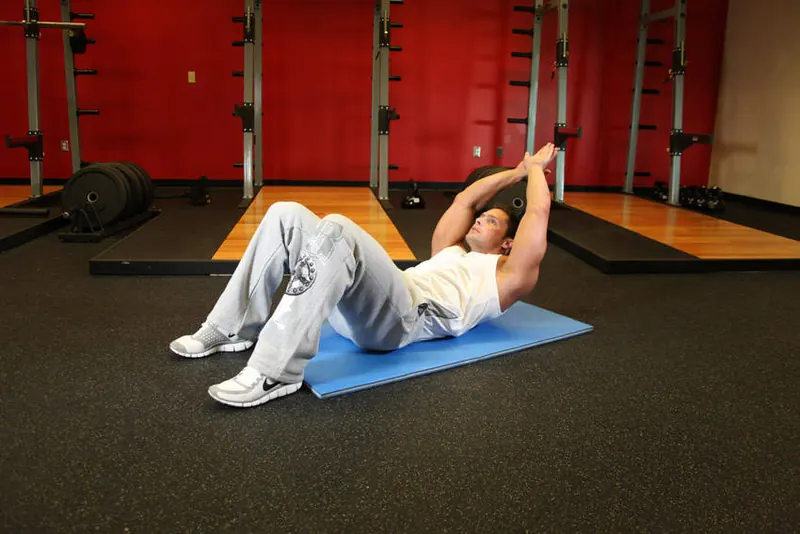 Crunch - Hands Overhead: end position