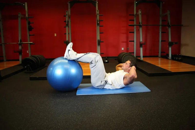 Crunch - Legs On Exercise Ball: end position