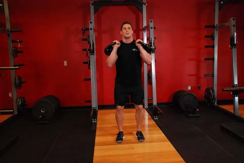 Double Kettlebell Jerk: end position