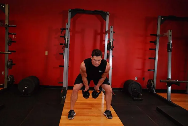 Double Kettlebell Snatch: end position