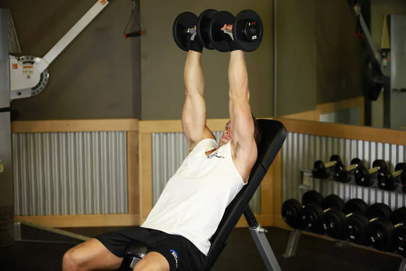 Dumbbell Incline Shoulder Raise: end position