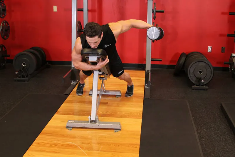 Dumbbell Lying One-Arm Rear Lateral Raise: end position