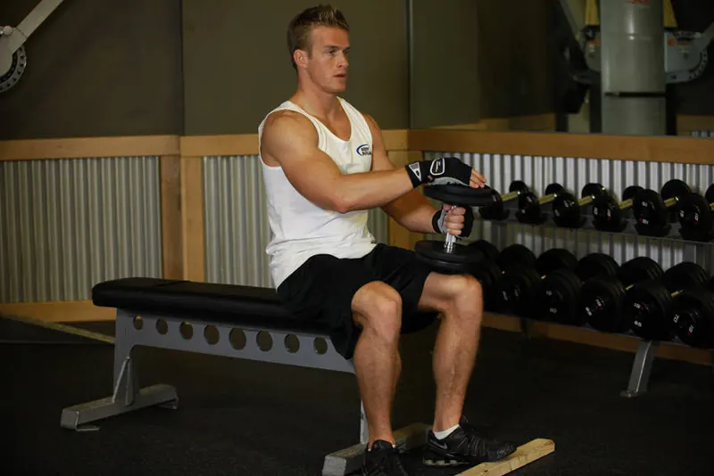 Dumbbell Seated One-Leg Calf Raise: end position