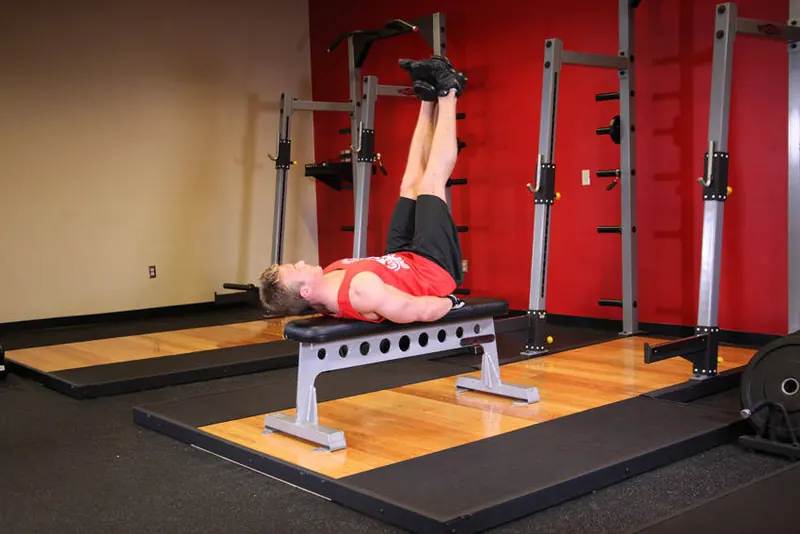 Flat Bench Lying Leg Raise: end position