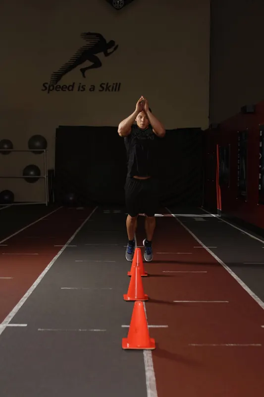 Front Cone Hops (or hurdle hops): starting position