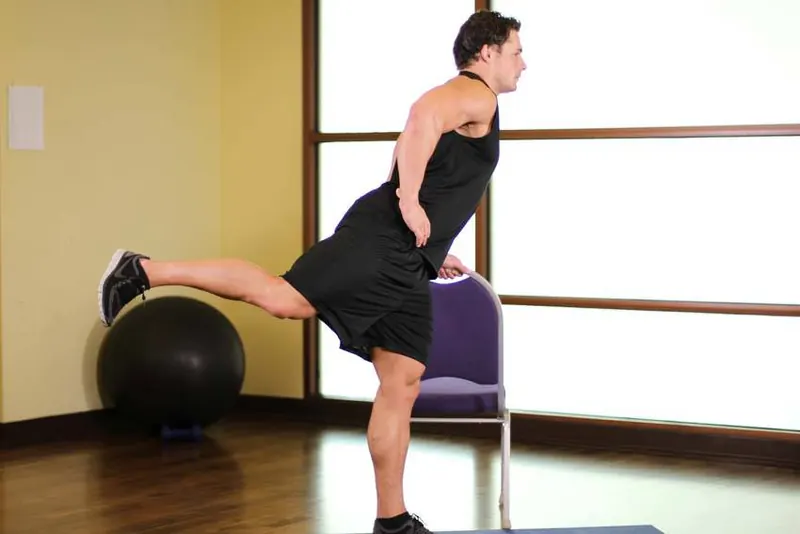 Front Leg Raises: end position