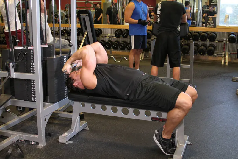 High Cable Curls: end position