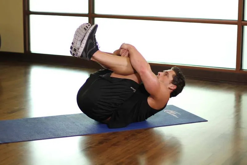 Hug Knees To Chest: end position