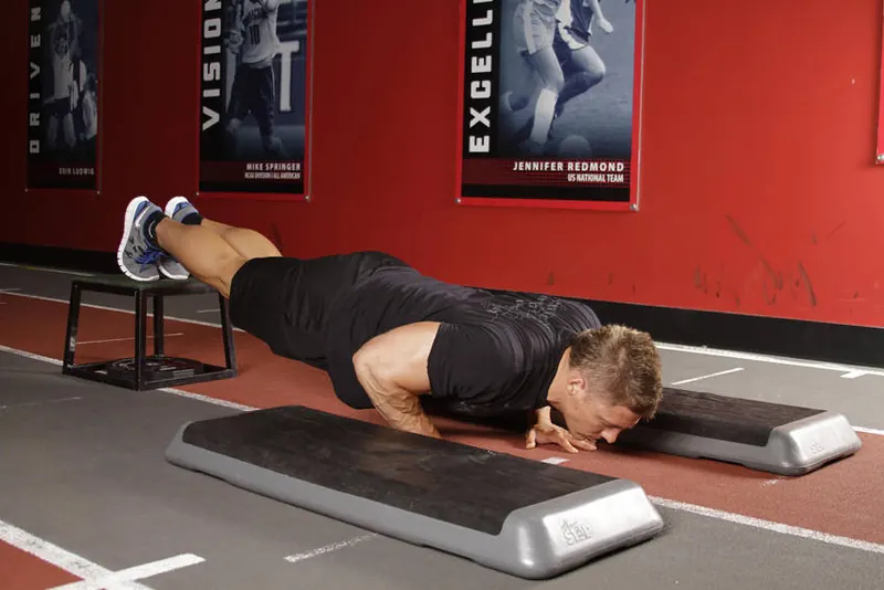 Incline Push-Up Depth Jump: starting position