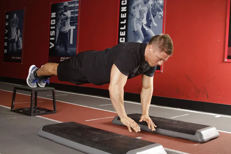 Incline Push-Up Depth Jump: end position