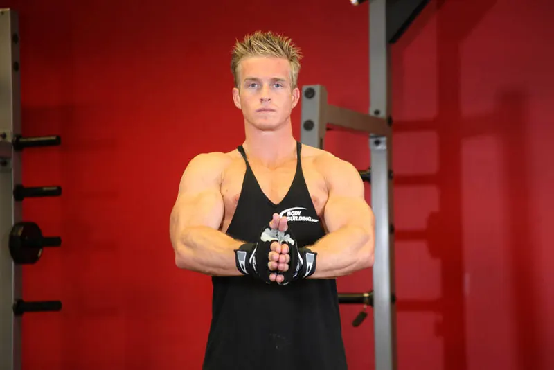 Isometric Chest Squeezes: end position