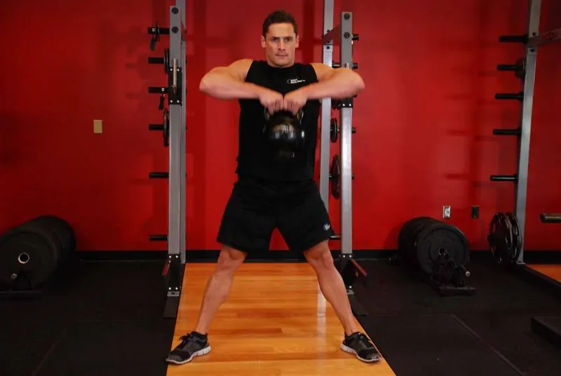 Kettlebell Sumo High Pull: end position