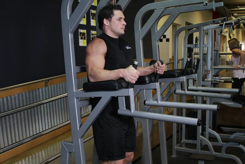 Knee/Hip Raise On Parallel Bars: starting position