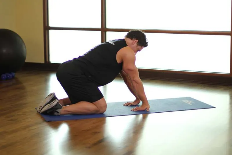 Kneeling Forearm Stretch: end position