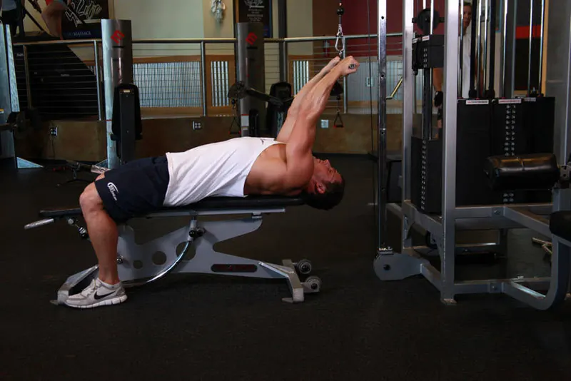 Lying Close-Grip Bar Curl On High Pulley: starting position