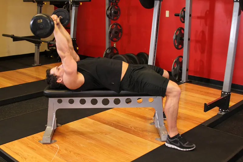 Lying Close-Grip Barbell Triceps Extension Behind The Head: end position