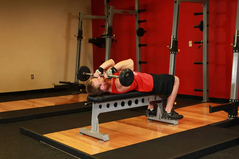 Lying Close-Grip Barbell Triceps Press To Chin: end position