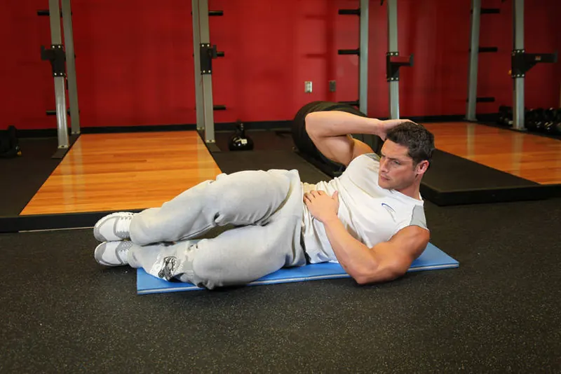 Oblique Crunches - On The Floor: end position