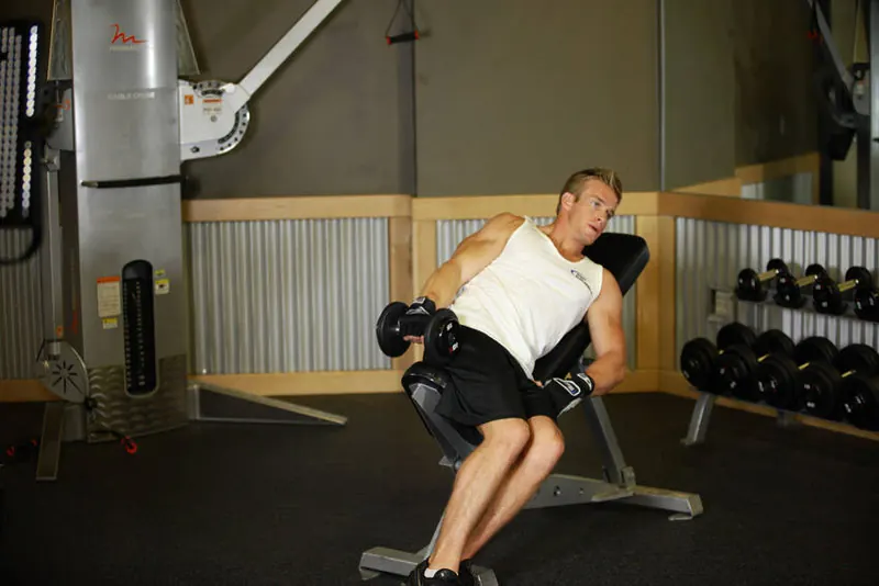 One-Arm Incline Lateral Raise: starting position