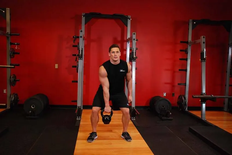One-Arm Kettlebell Clean and Jerk: starting position