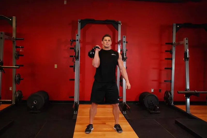 One-Arm Kettlebell Clean and Jerk: end position