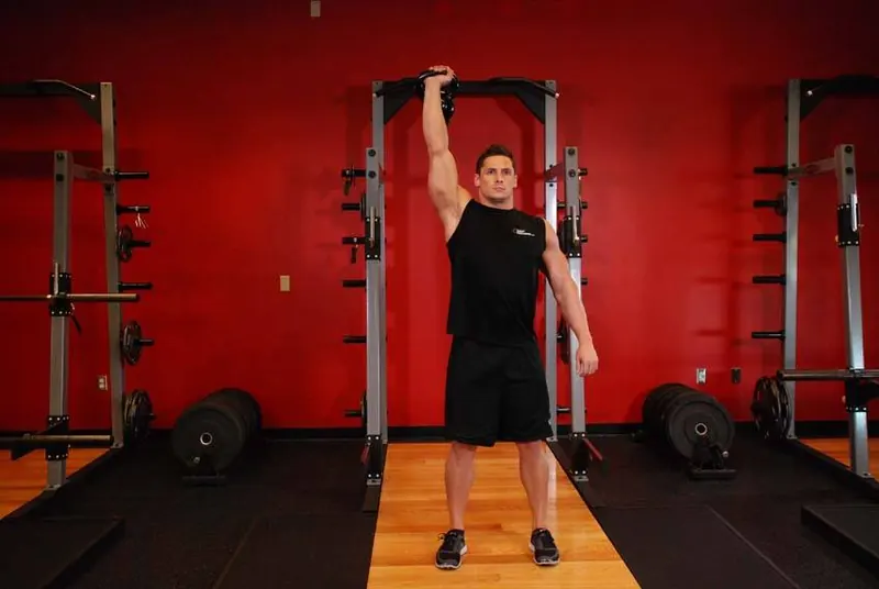 One-Arm Kettlebell Para Press: end position