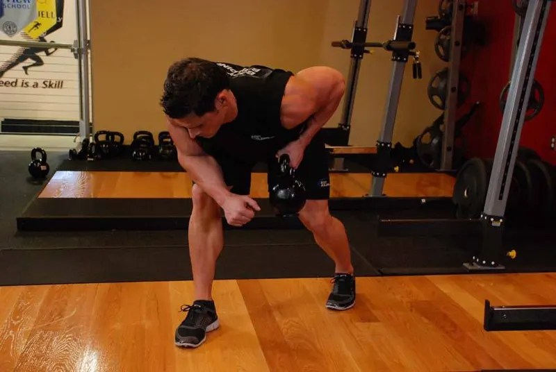 One-Arm Kettlebell Row: end position