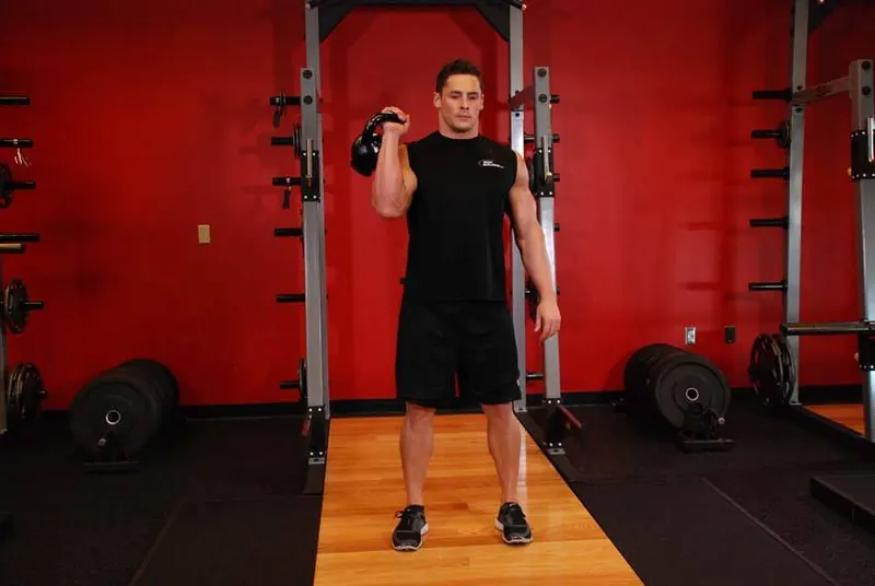 One-Arm Kettlebell Split Jerk: starting position