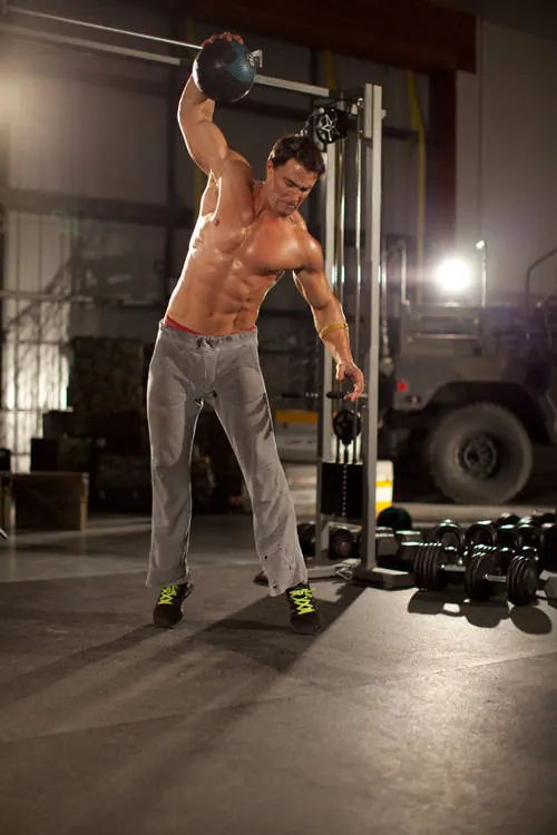 One-Arm Medicine Ball Slam: starting position