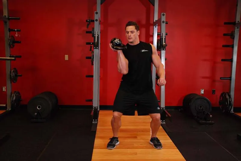 One-Arm Open Palm Kettlebell Clean: end position