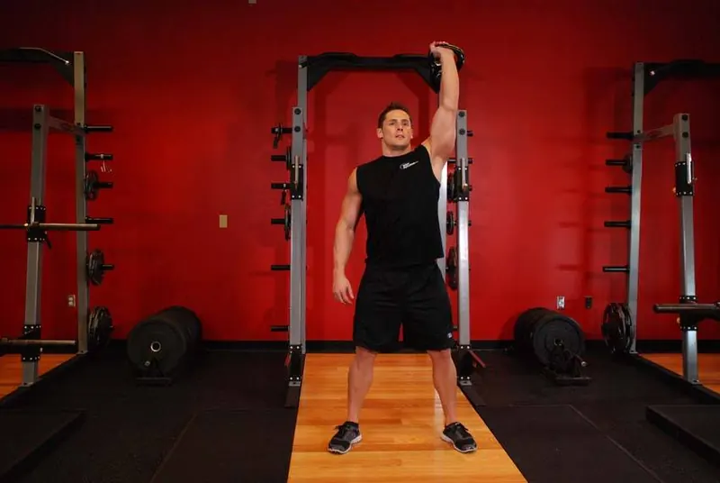 One-Arm Overhead Kettlebell Squats: starting position