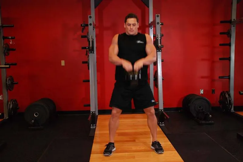 Open Palm Kettlebell Clean: end position