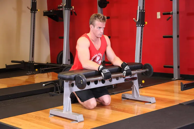 Palms-Down Wrist Curl Over A Bench: starting position
