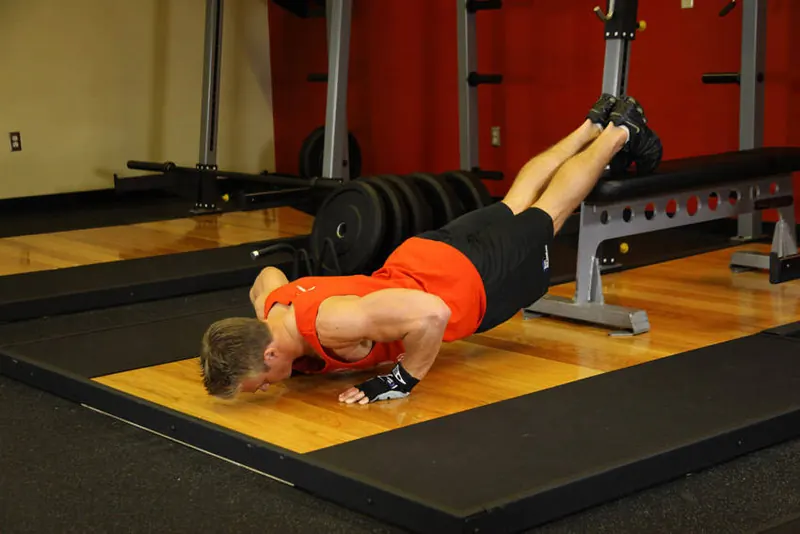 Push-Ups With Feet Elevated: end position