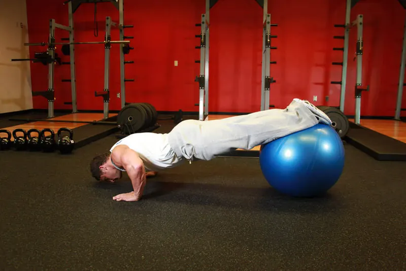 Push-Ups With Feet On An Exercise Ball: starting position