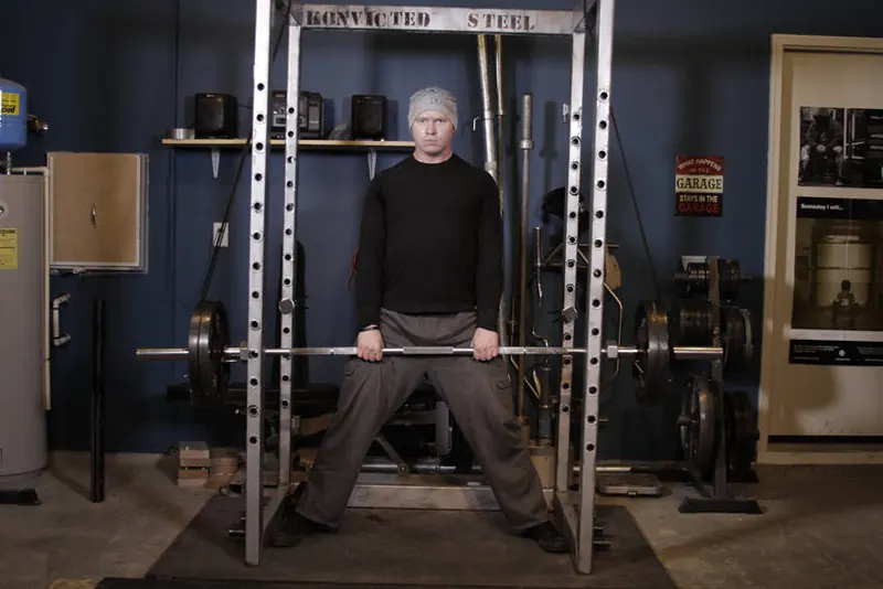 Reverse Band Sumo Deadlift: end position