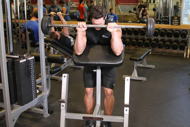 Reverse Barbell Preacher Curls: end position