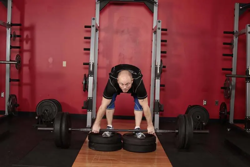 Romanian Deadlift from Deficit: end position