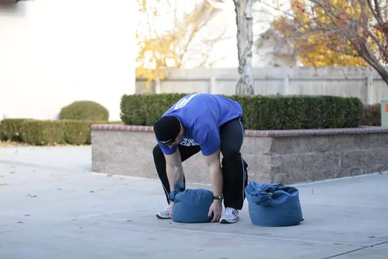Sandbag Load: starting position