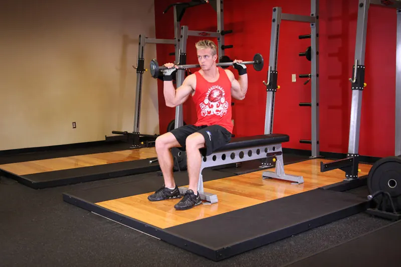 Seated Barbell Twist: end position