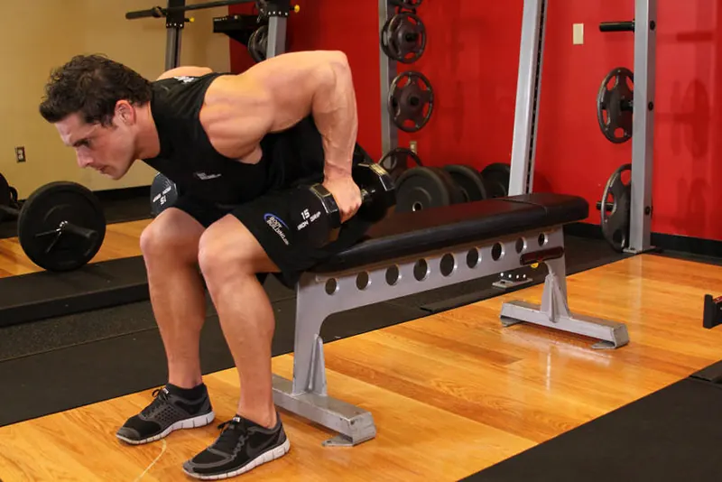 Seated Bent-Over Two-Arm Dumbbell Triceps Extension: starting position