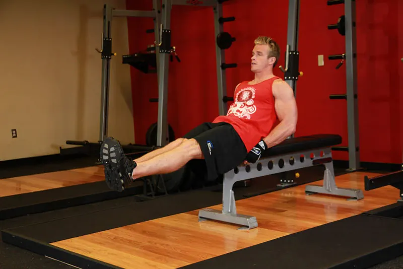 Seated Flat Bench Leg Pull-In: starting position